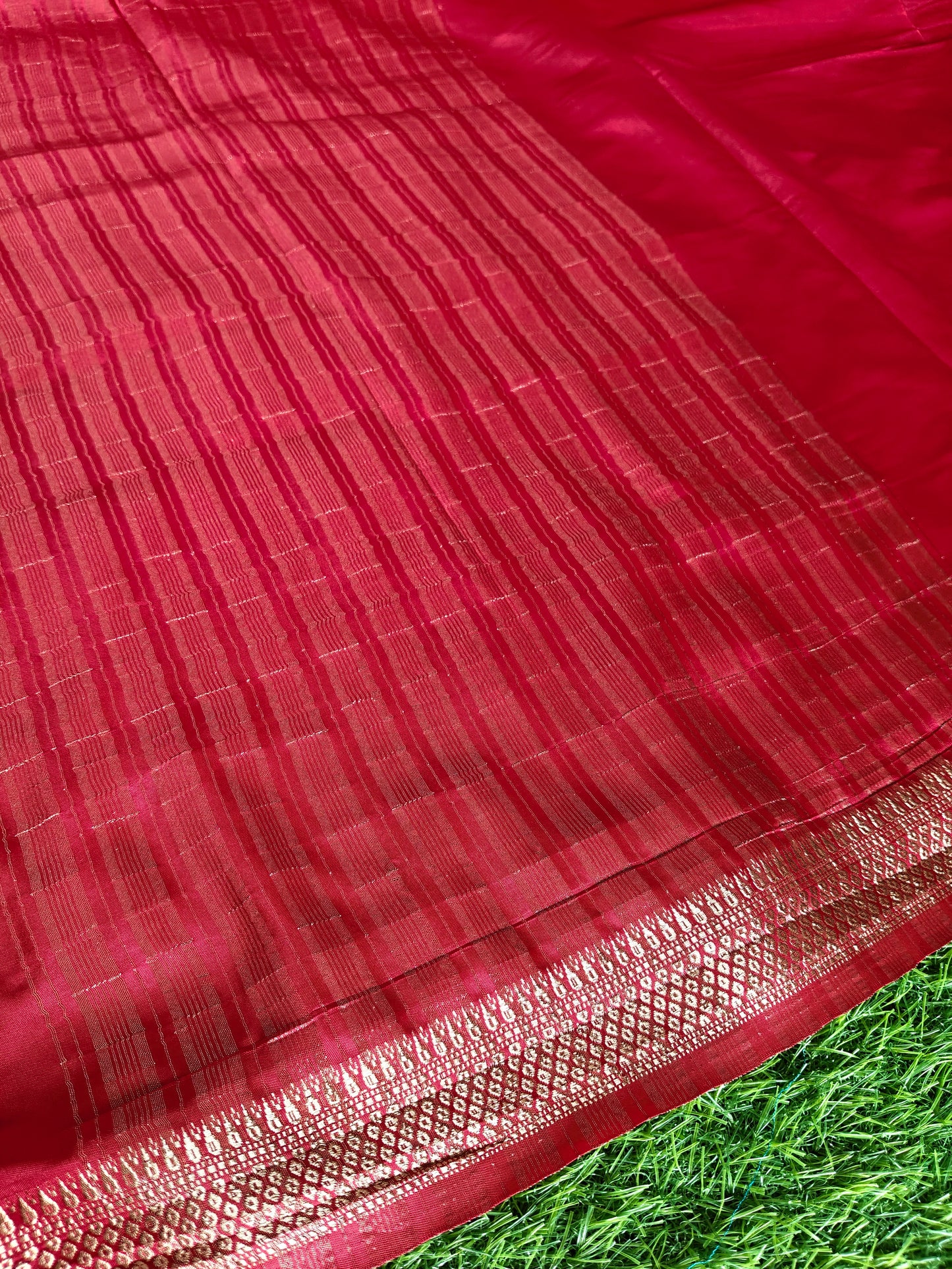 Tomato red colour semi crepe solid colour with slim border