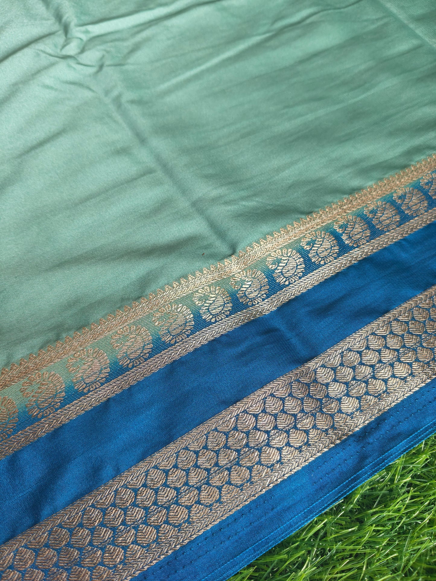 Light green colour semi crepe solid colour with slim contrast border