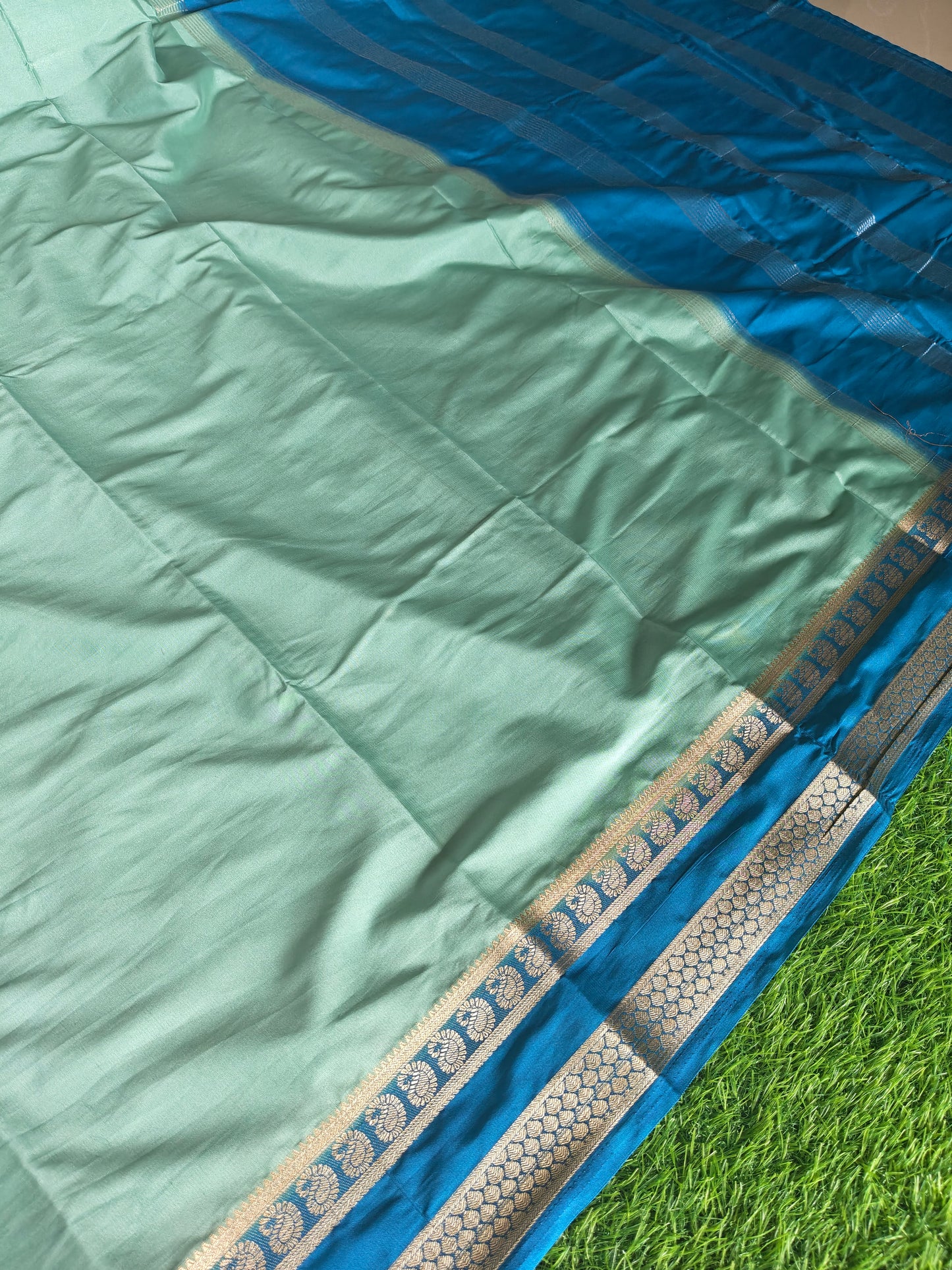 Light green colour semi crepe solid colour with slim contrast border