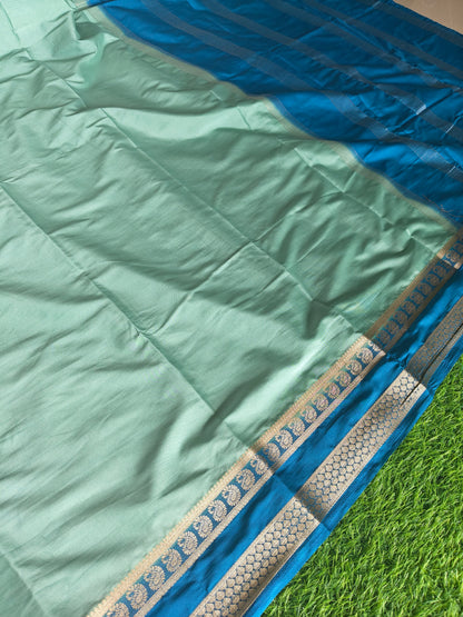 Light green colour semi crepe solid colour with slim contrast border