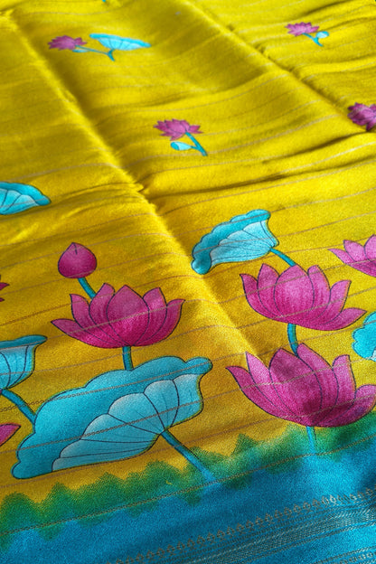 Yellow saree with colorful floral patterns

