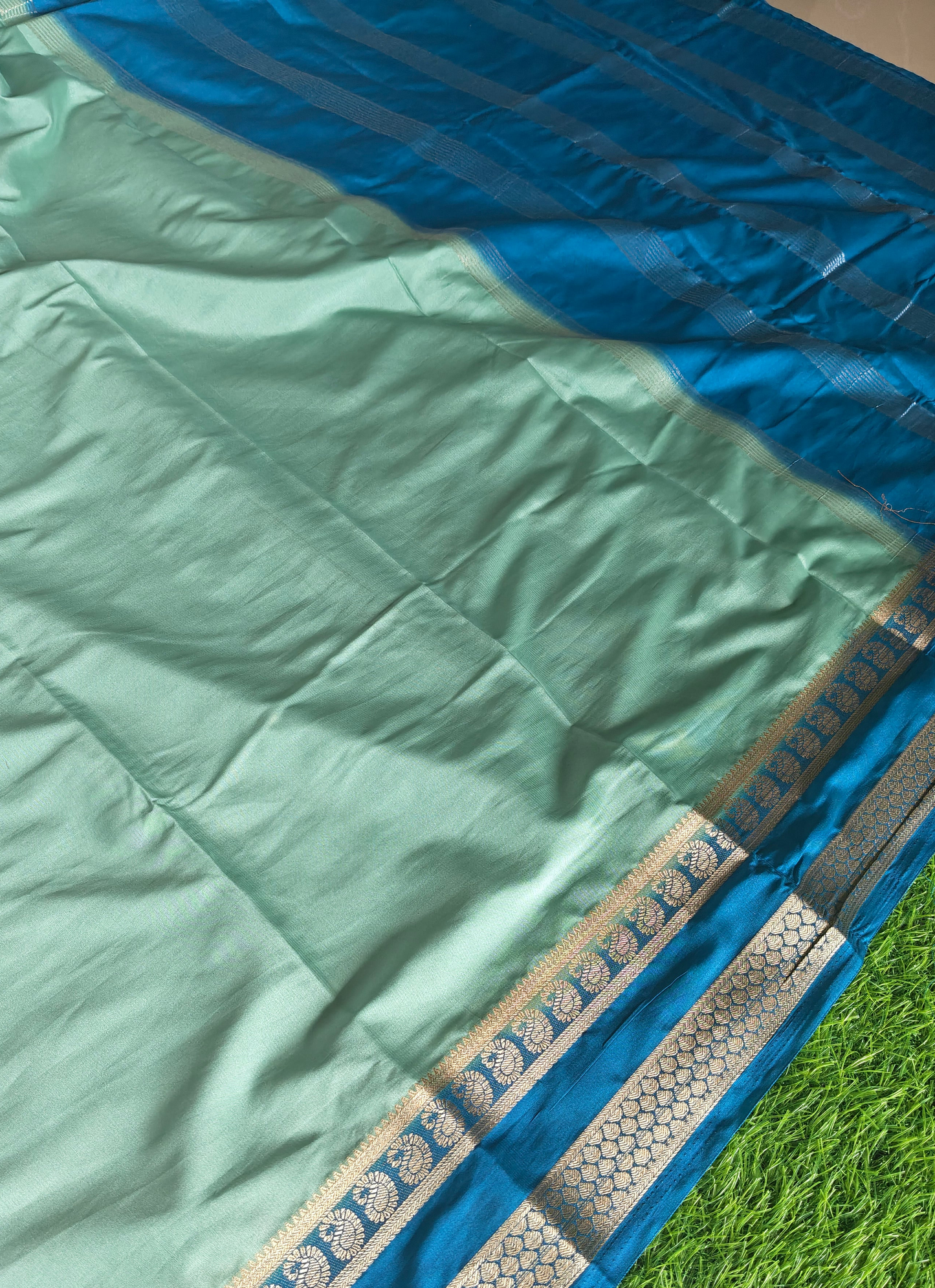 Light green colour semi crepe solid colour with slim contrast border