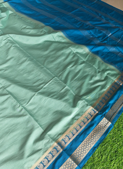 Light green colour semi crepe solid colour with slim contrast border