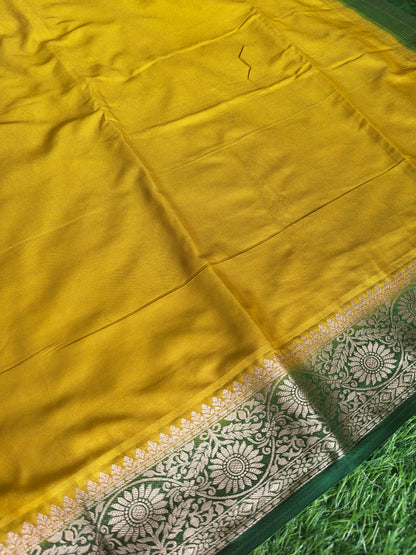Yellow colour semi crepe solid colour with slim contrast border
