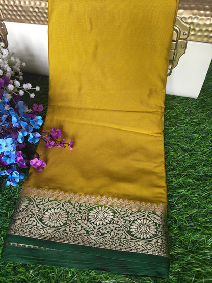 Yellow colour semi crepe solid colour with slim contrast border