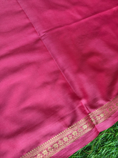 Carrot pink colour semi crepe solid colour with slim border