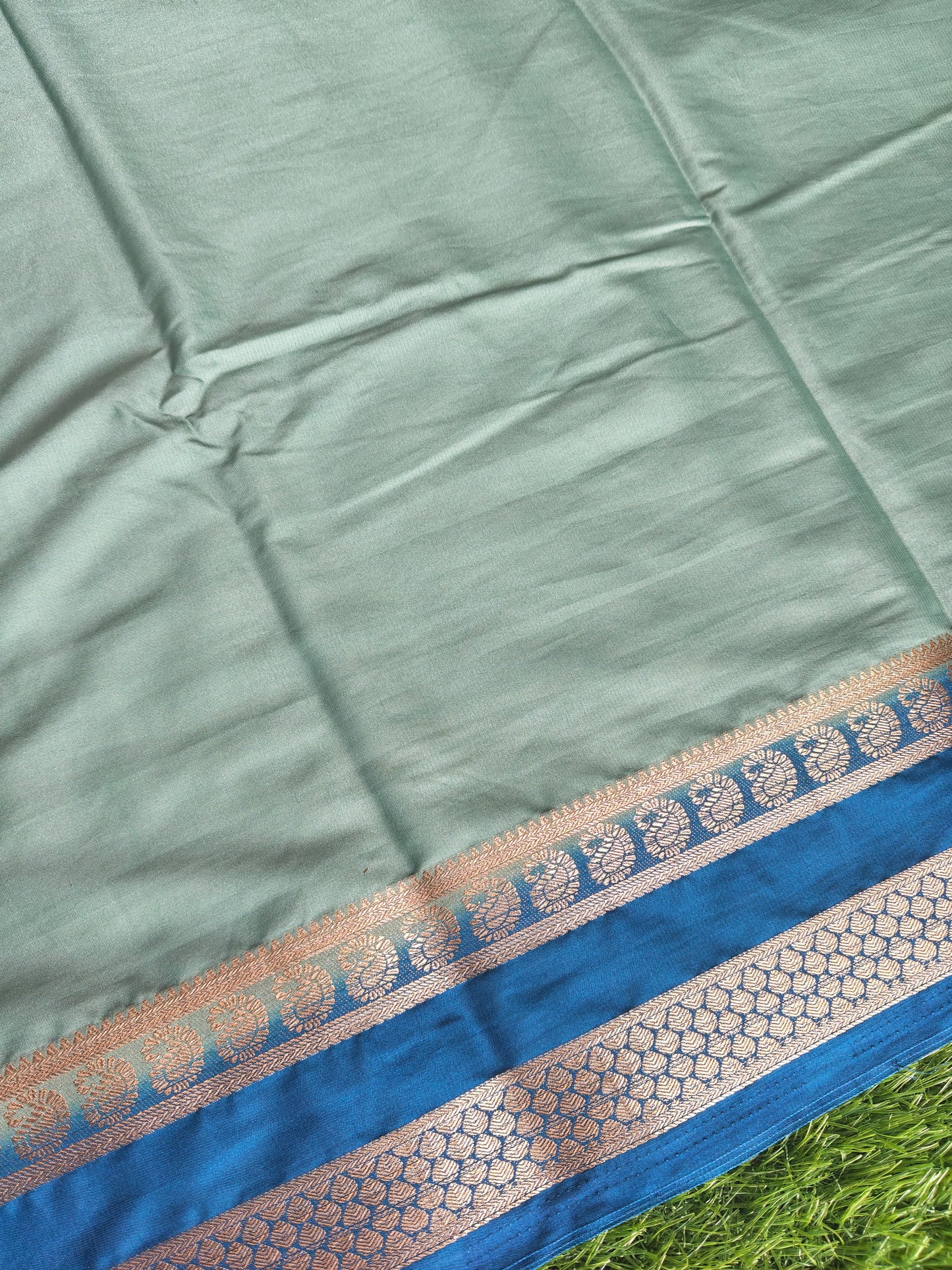Light green colour semi crepe solid colour with slim contrast border