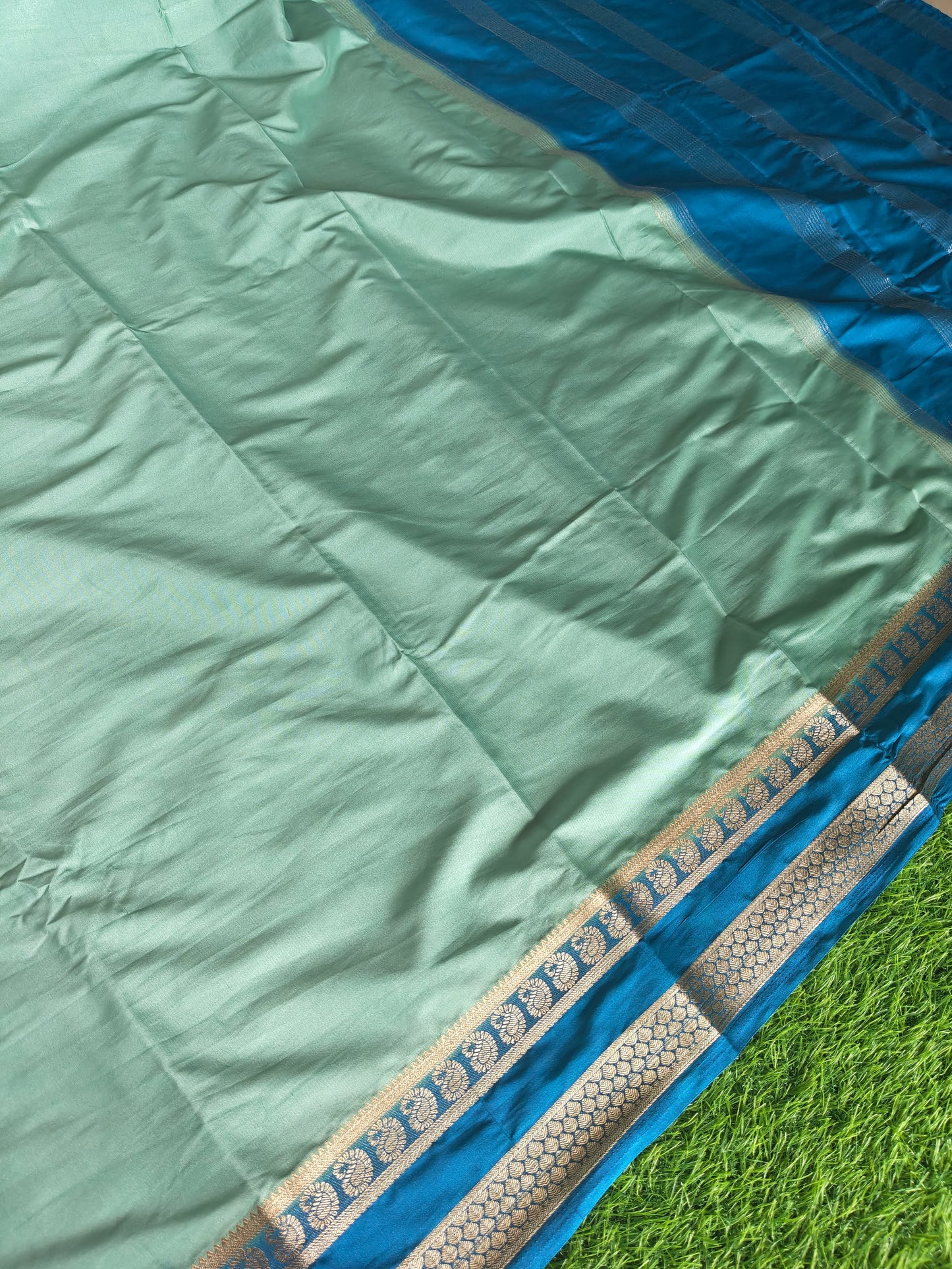 Light green colour semi crepe solid colour with slim contrast border