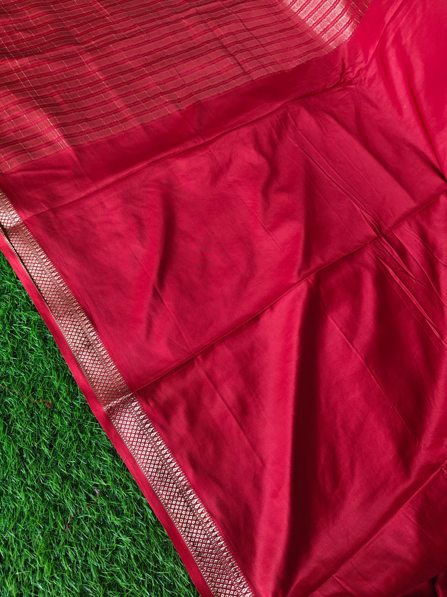 Tomato red colour semi crepe solid colour with slim border