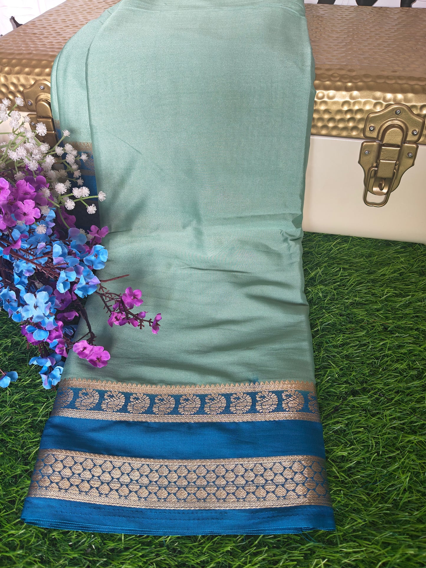 Light green colour semi crepe solid colour with slim contrast border