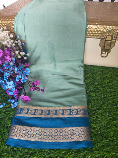 Light green colour semi crepe solid colour with slim contrast border
